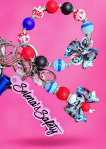 Load image into Gallery viewer, Jason Coquette Bow Safety Keychain

