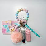 Load image into Gallery viewer, Handmade &quot;Cotton Candy Skies&quot; Beaded Wallet Self-Defense Keychain
